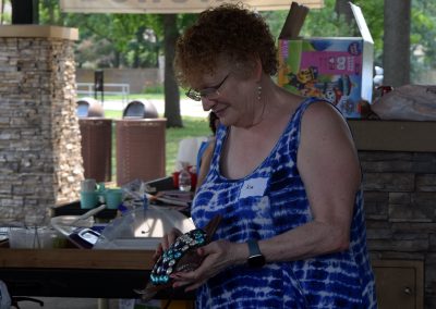 Kim with an Auction item up for bidding on