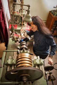 Brittany Nicole Cox demonstrating what a horologist does