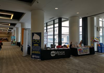 MAM's volunteer table at Planet Comicon 2024