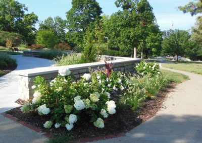Flower bed blooming at Antioch Park admin offices