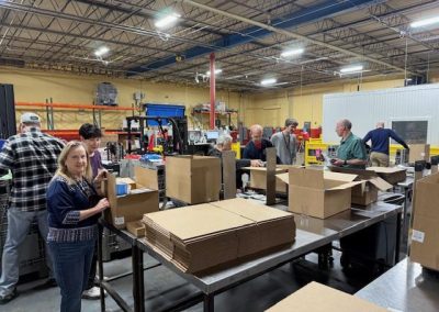 Volunteers helping out at Harvesters Mensa event